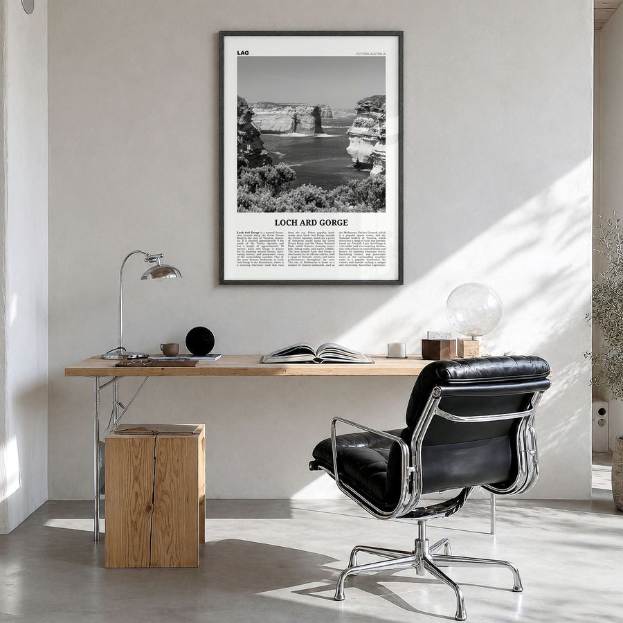 Loch Ard Gorge Newspaper Poster in a black wood frame, hanging in a bright home office