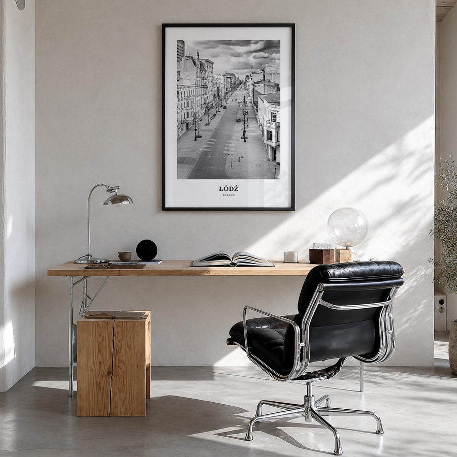 Łódź black & white classic poster of Poland – vertical wall art in black wood frame, hanging on wall