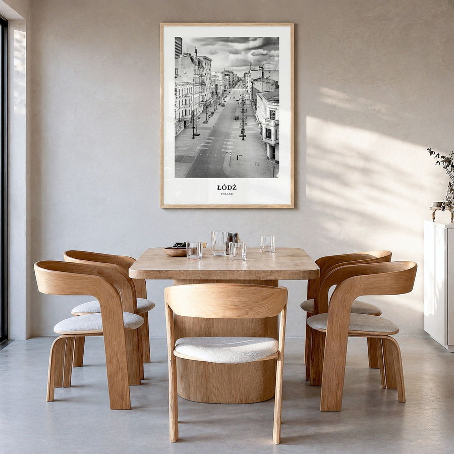 Łódź Classic Poster in a natural wood frame, hanging in a dining room