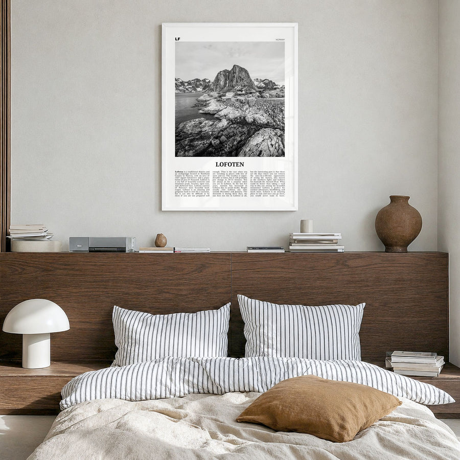 Lofoten Newspaper Poster in a white wood frame, hanging in a bedroom