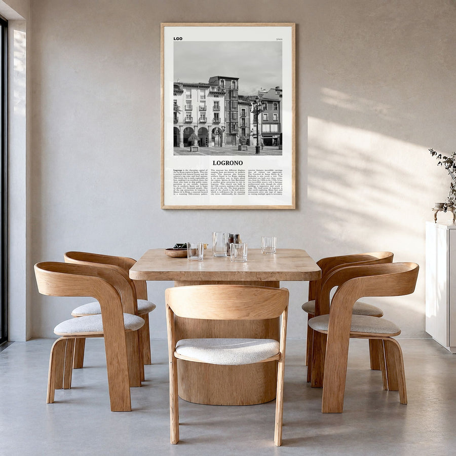 Logroño Newspaper Poster in a natural wood frame, hanging in a dining room