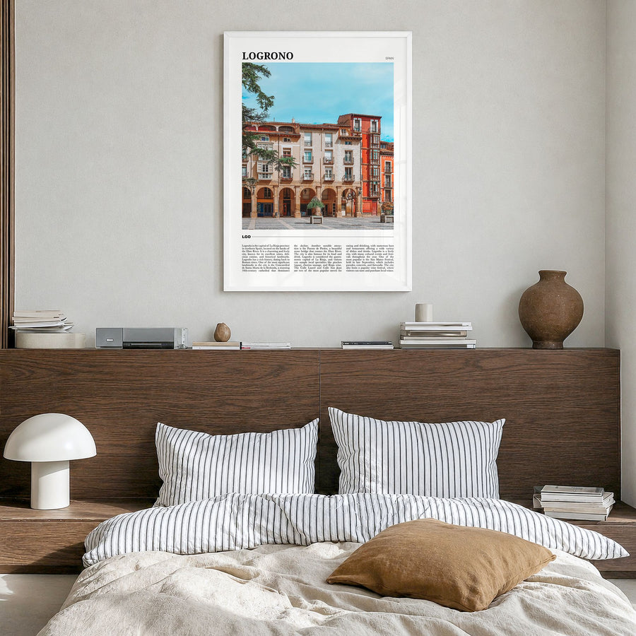Logroño Travel Poster in a white wood frame, hanging in a bedroom
