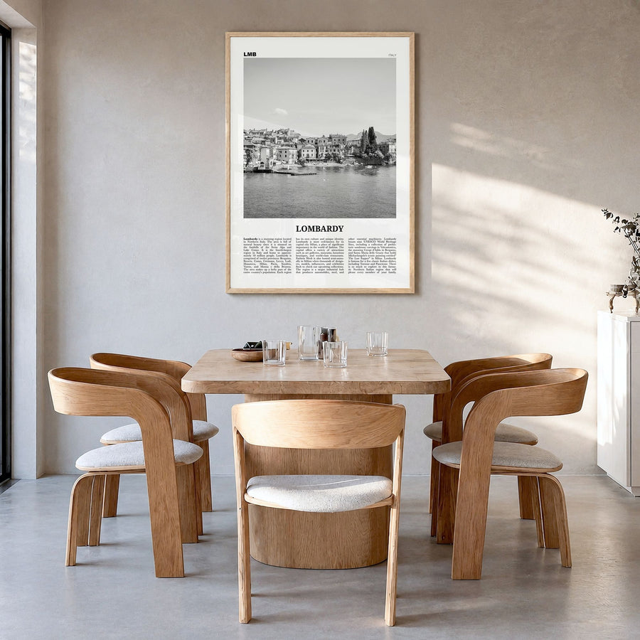 Lombardy Newspaper Poster in a natural wood frame, hanging in a dining room