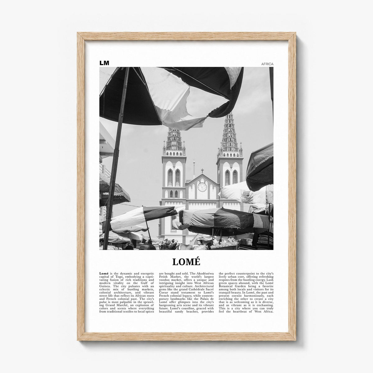 Lomé Newspaper Poster in a natural wood frame