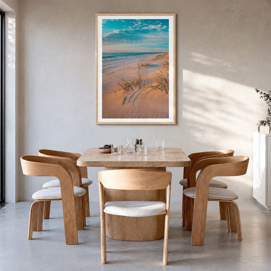 Long Beach Island Photo Poster in a natural wood frame, hanging in a dining room, white border