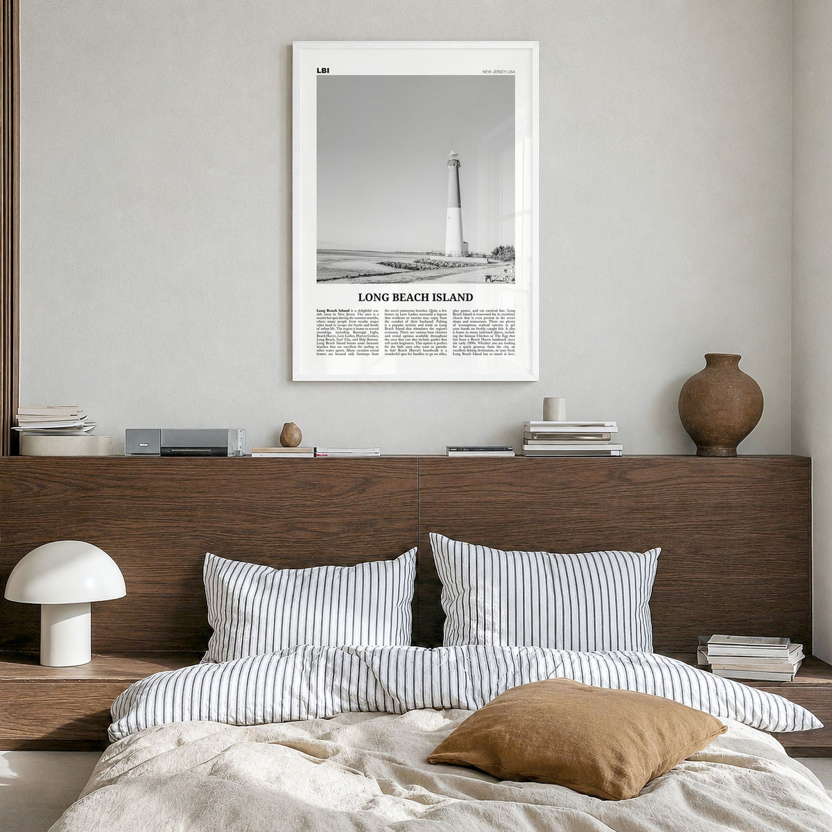 Long Beach Island Newspaper Poster in a white wood frame, hanging in a bedroom