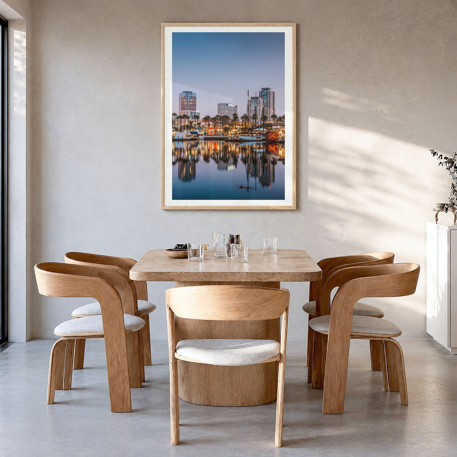 Long Beach Photo No 1 Poster in a natural wood frame, hanging in a dining room, white border