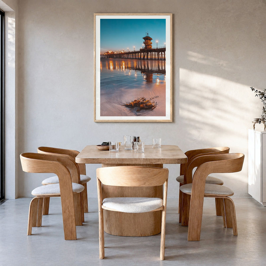 Long Beach Photo No 2 Poster in a natural wood frame, hanging in a dining room, white border