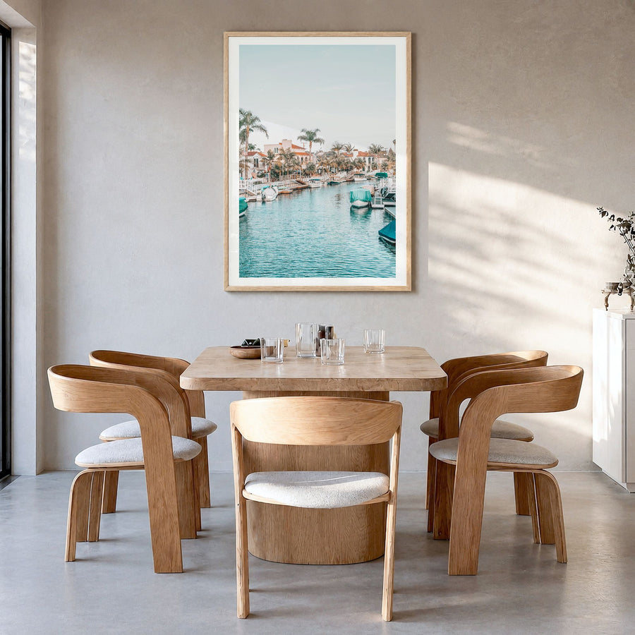 Long Beach Photo No 4 Poster in a natural wood frame, hanging in a dining room, white border