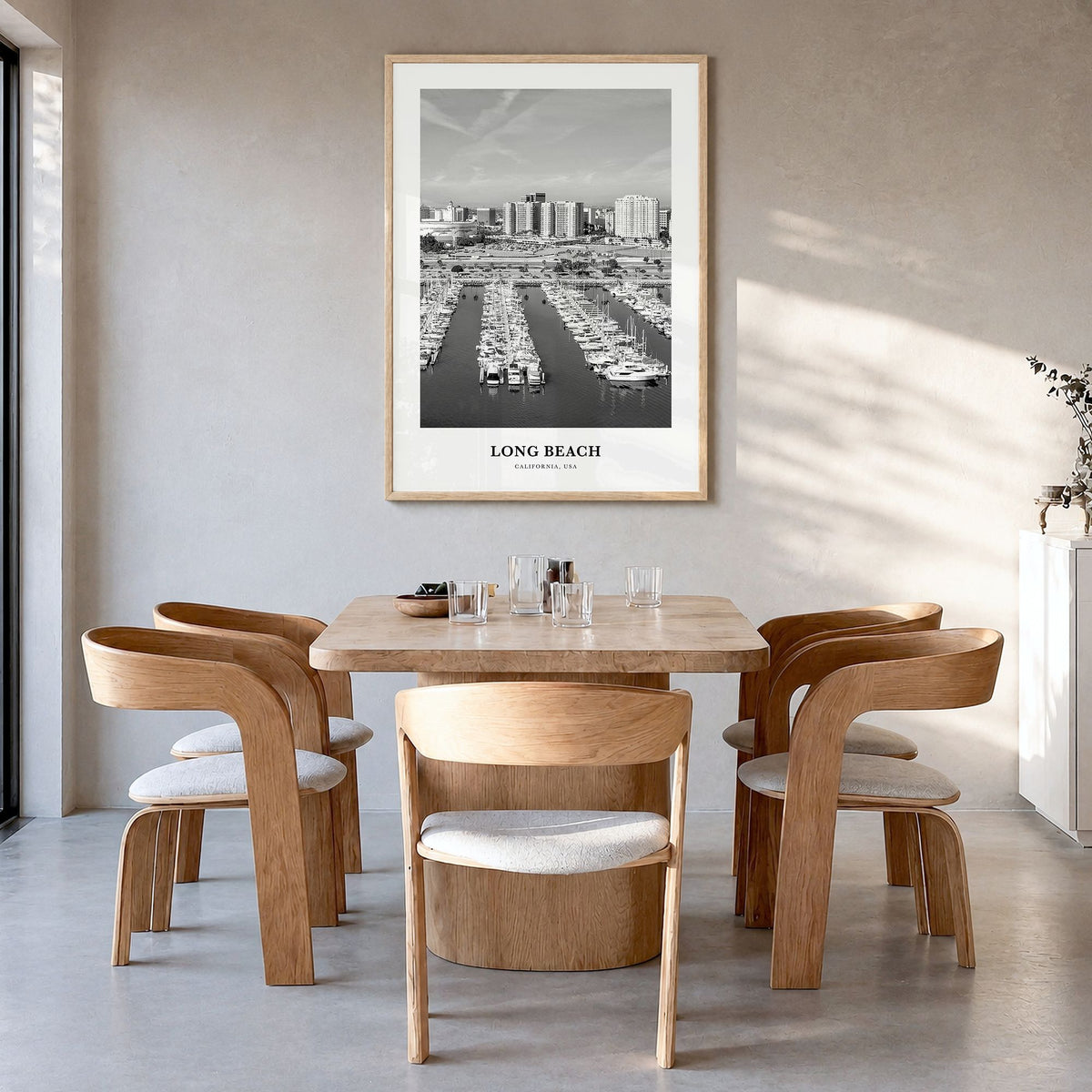 Long Beach Classic No 2 Poster in a natural wood frame, hanging in a dining room