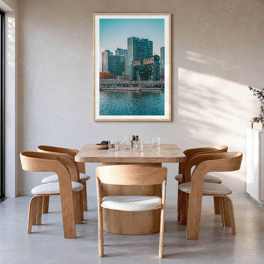Long Island Photo No 2 Poster in a natural wood frame, hanging in a dining room, white border