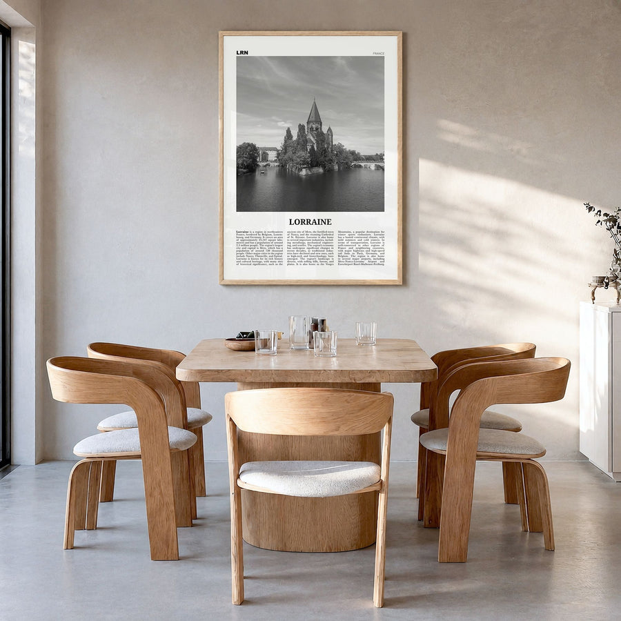 Lorraine Newspaper Poster in a natural wood frame, hanging in a dining room