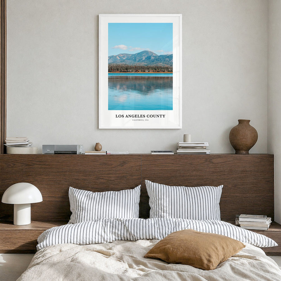 Los Angeles County Classic Poster in a white wood frame, hanging in a bedroom