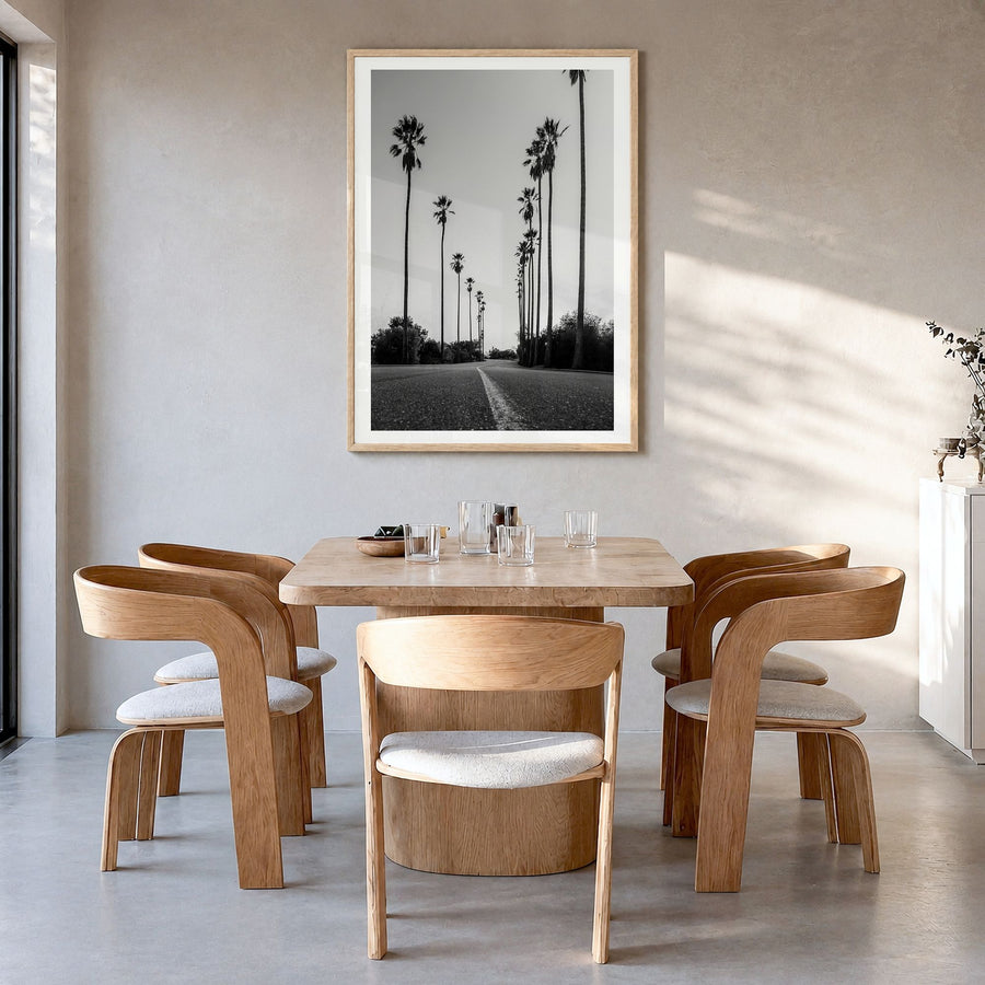 Los Angeles Photo No 2 Poster in a natural wood frame, hanging in a dining room, white border