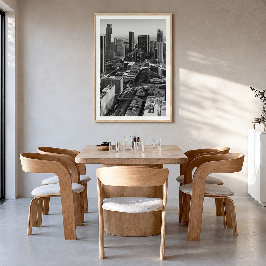 Los Angeles Photo No 3 Poster in a natural wood frame, hanging in a dining room, white border