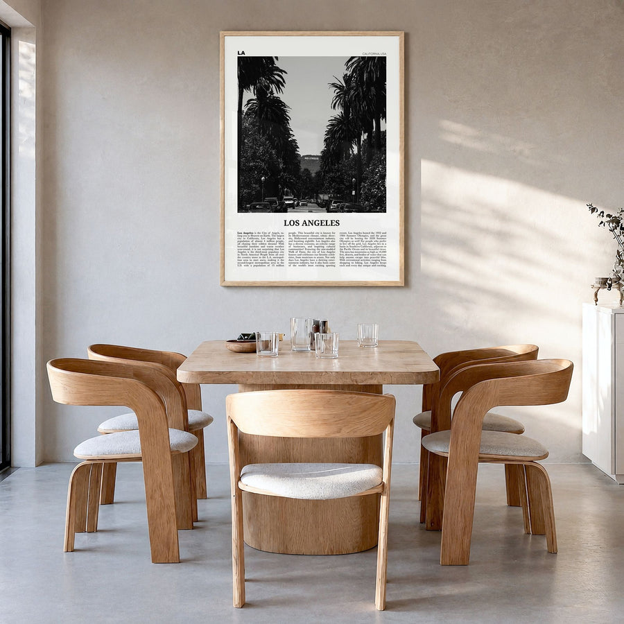 Los Angeles Newspaper No 1 Poster in a natural wood frame, hanging in a dining room