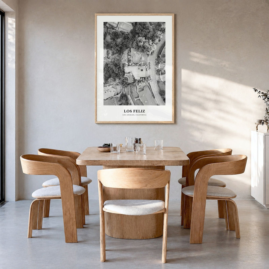 Los Feliz Classic Poster in a natural wood frame, hanging in a dining room