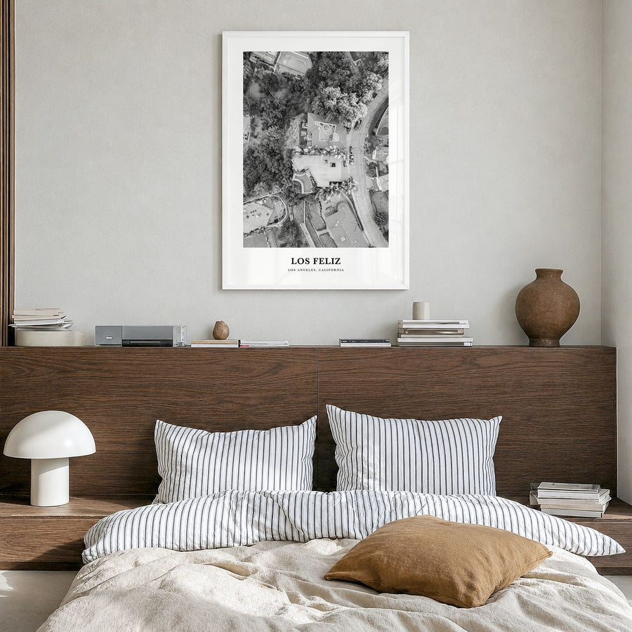 Los Feliz Classic Poster in a white wood frame, hanging in a bedroom