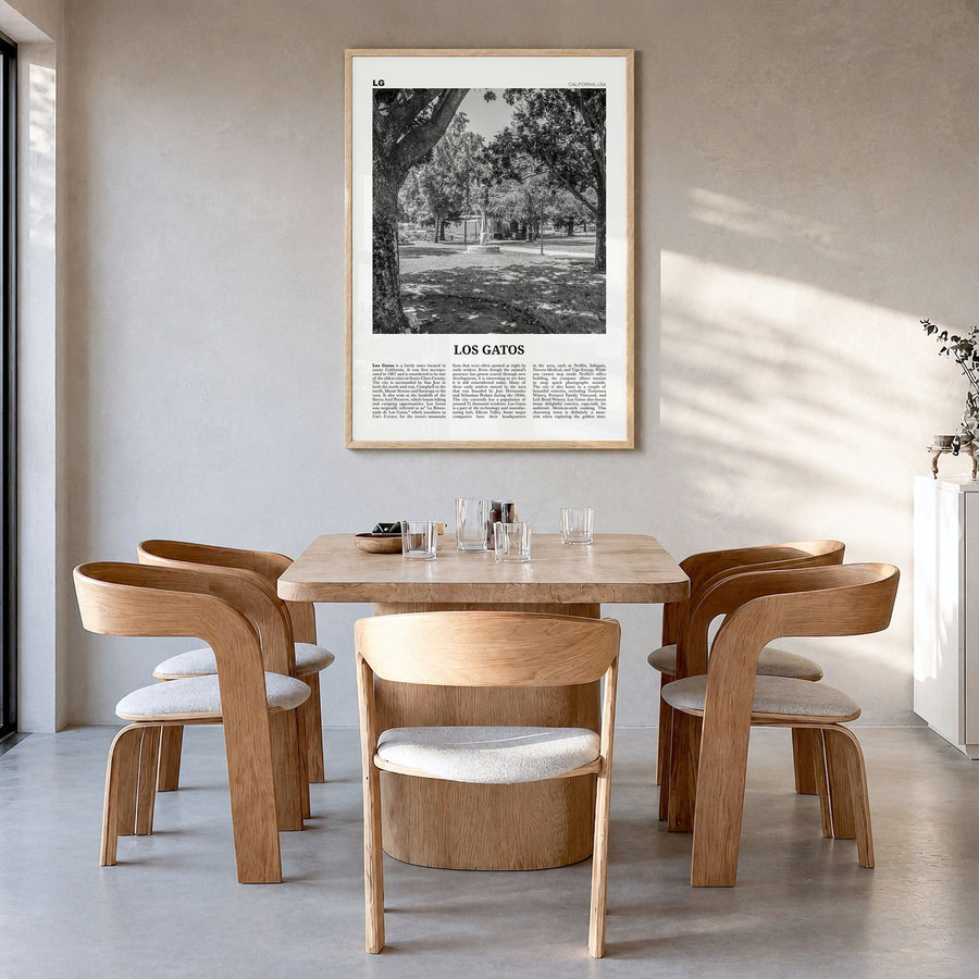 Los Gatos Newspaper Poster in a natural wood frame, hanging in a dining room