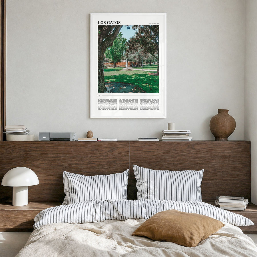 Los Gatos Travel Poster in a white wood frame, hanging in a bedroom