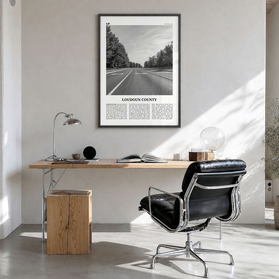 Loudoun County Newspaper Poster in a black wood frame, hanging in a bright home office