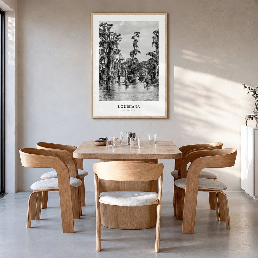 Louisiana Classic Poster in a natural wood frame, hanging in a dining room