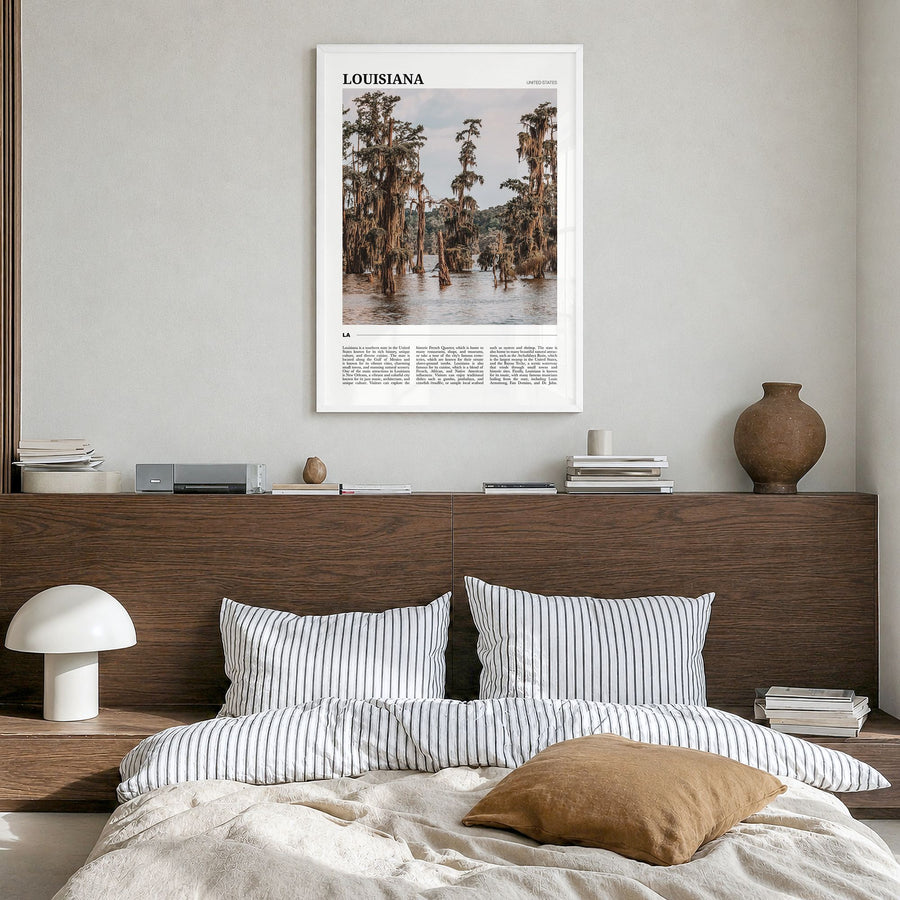 Louisiana Travel Poster in a white wood frame, hanging in a bedroom
