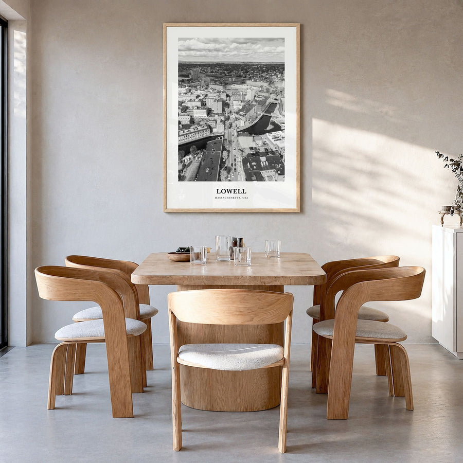Lowell Classic Poster in a natural wood frame, hanging in a dining room