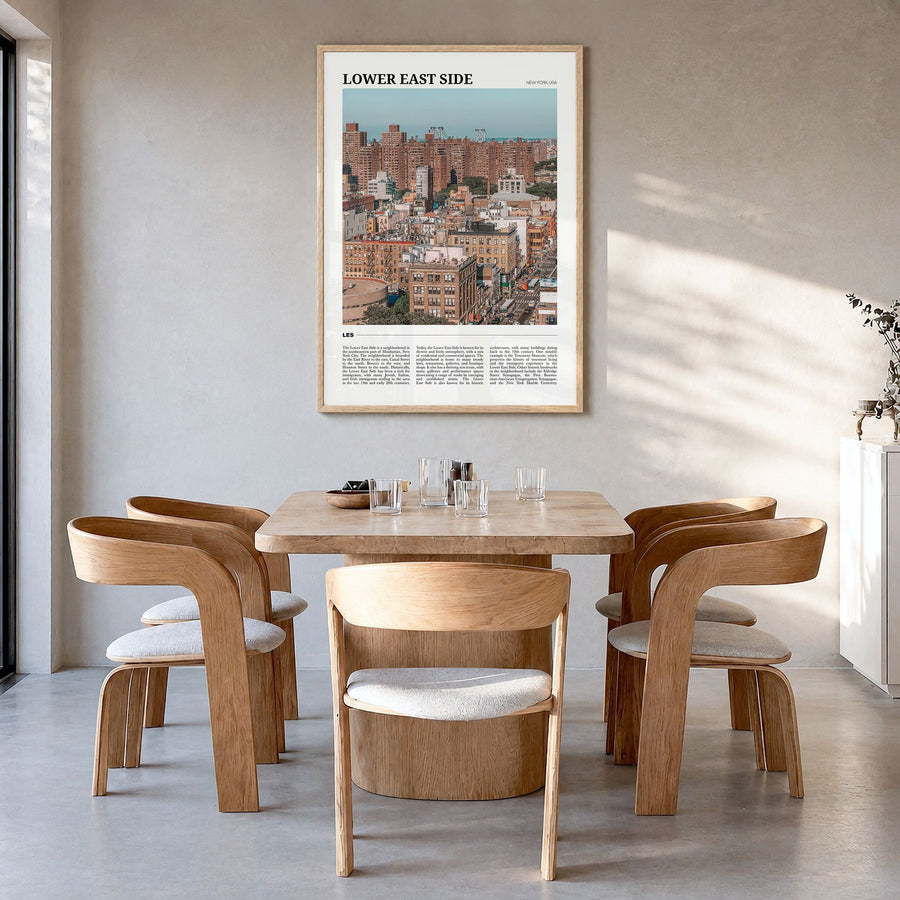 Lower East Side Travel Poster in a natural wood frame, hanging in a dining room