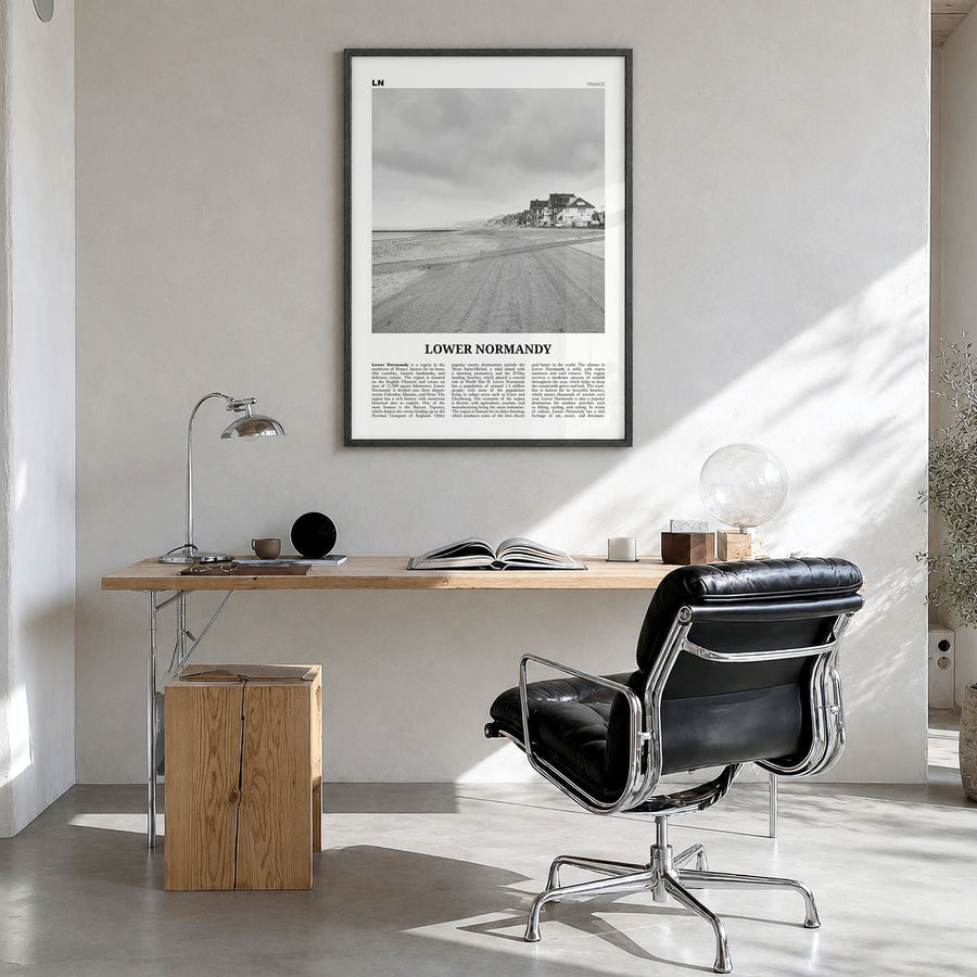 Lower Normandy Newspaper Poster in a black wood frame, hanging in a bright home office