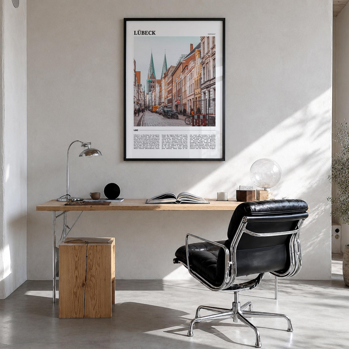 Lübeck colorful travel poster of Germany – vertical wall art in black wood frame, hanging on wall