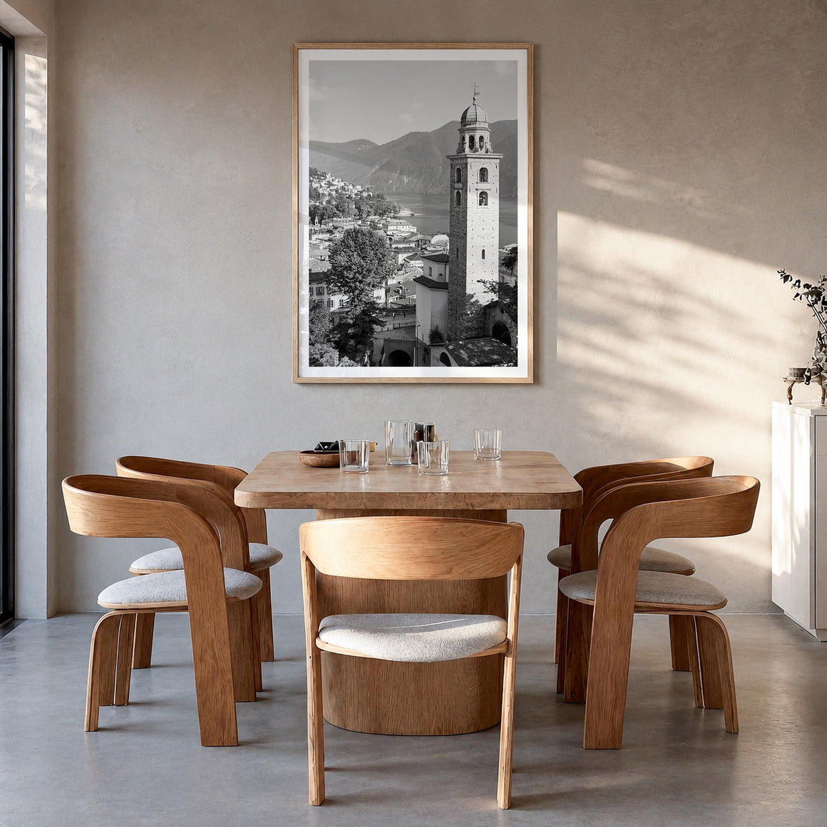 Lugano black & white photo poster of Switzerland – vertical wall art in natural wood frame with white border, hanging on wall