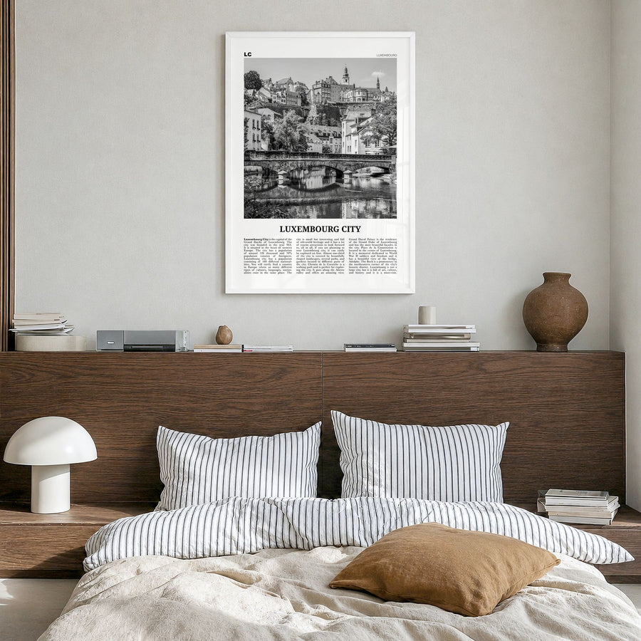 Luxembourg City Newspaper Poster in a white wood frame, hanging in a bedroom