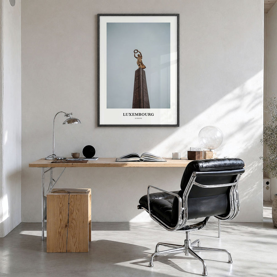 Luxembourg Classic Poster in a black wood frame, hanging in a bright home office