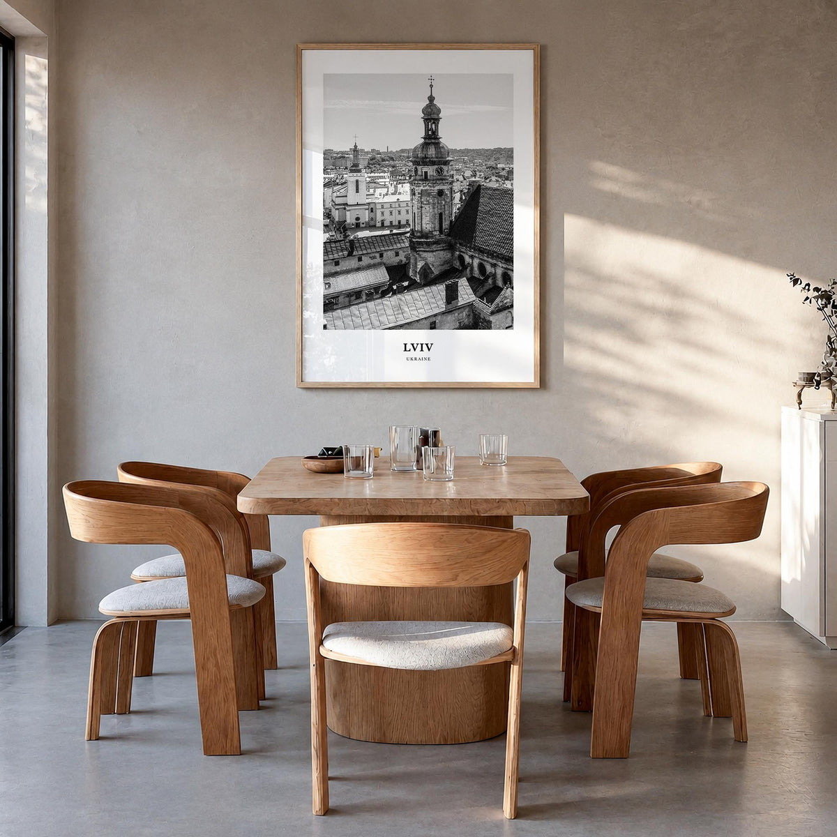Lviv black & white classic poster of Ukraine – vertical wall art in natural wood frame, hanging on wall