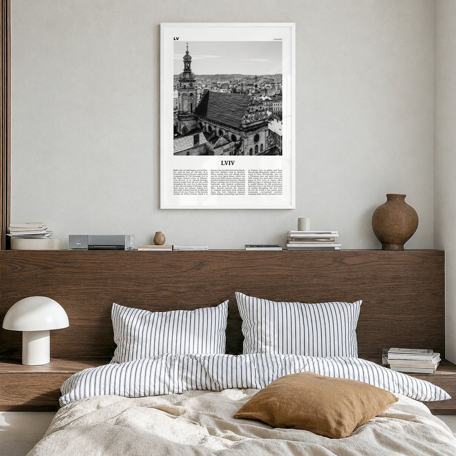 Lviv Newspaper Poster in a white wood frame, hanging in a bedroom