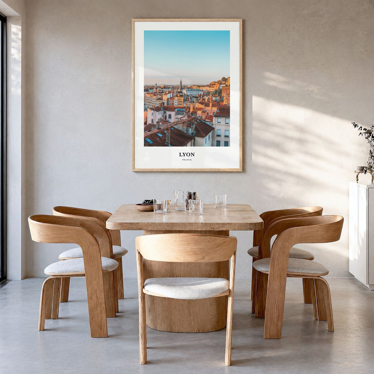 Lyon Classic Poster in a natural wood frame, hanging in a dining room