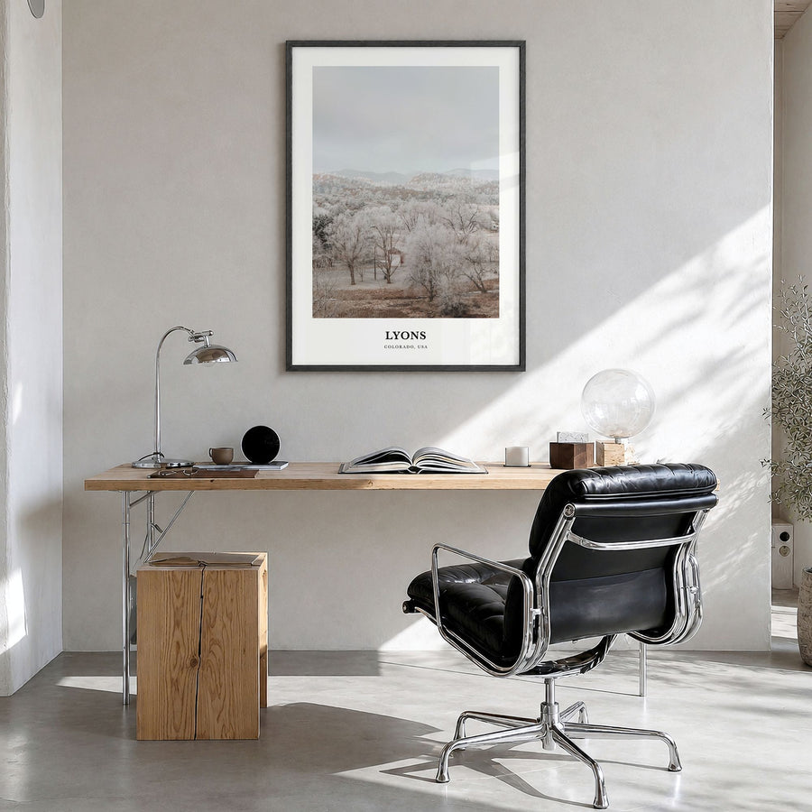 Lyons Classic Poster in a black wood frame, hanging in a bright home office