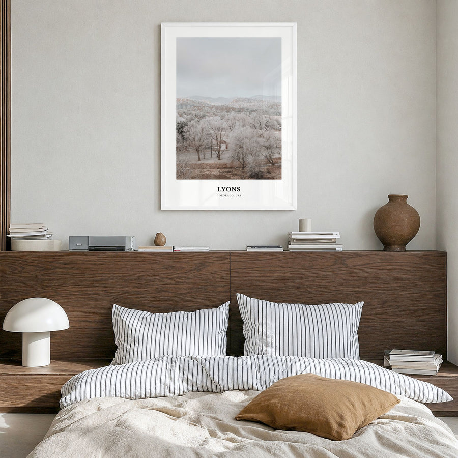Lyons Classic Poster in a white wood frame, hanging in a bedroom