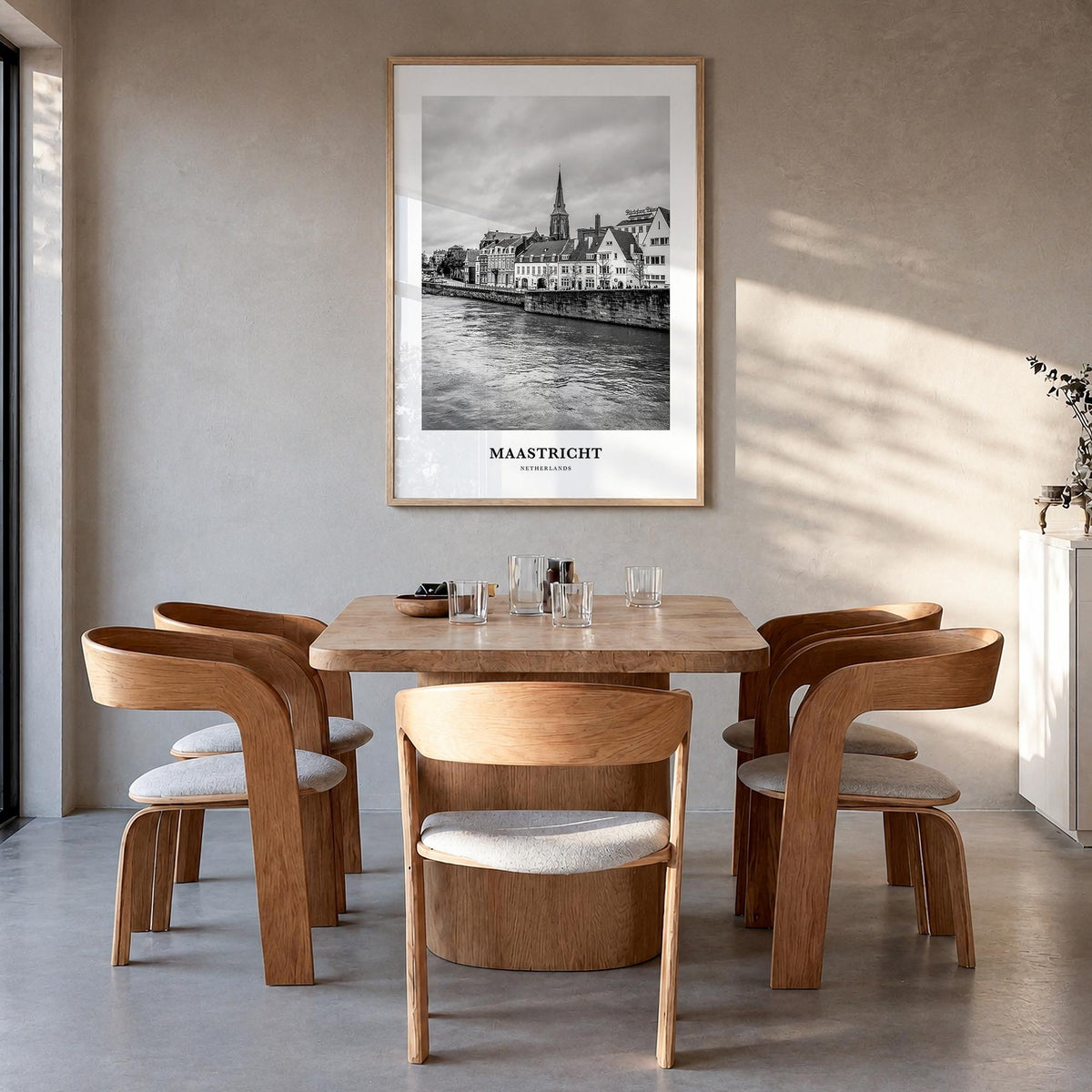 Maastricht black & white classic poster of Netherlands – vertical wall art in natural wood frame, hanging on wall
