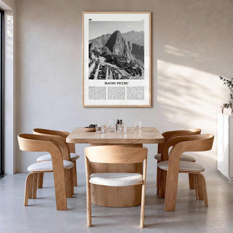 Machu Picchu Newspaper Poster in a natural wood frame, hanging in a dining room