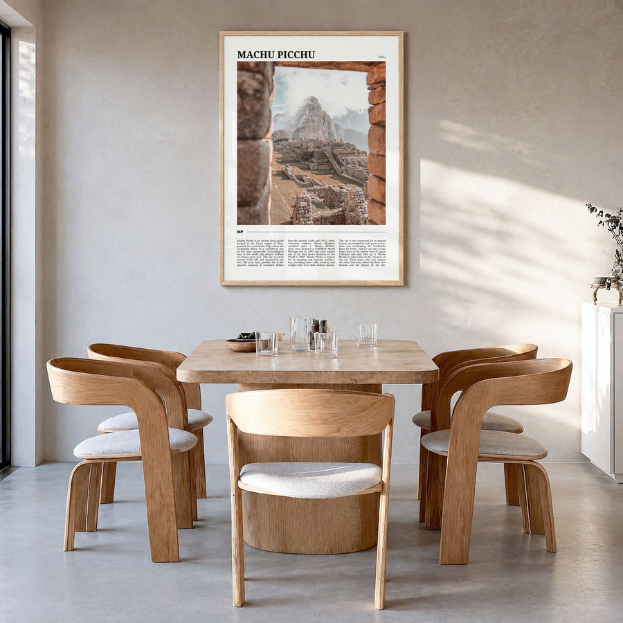 Machu Picchu Travel Poster in a natural wood frame, hanging in a dining room