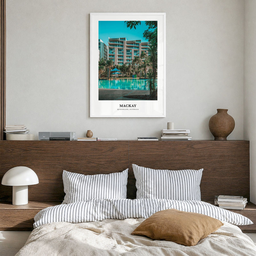 Mackay Classic Poster in a white wood frame, hanging in a bedroom