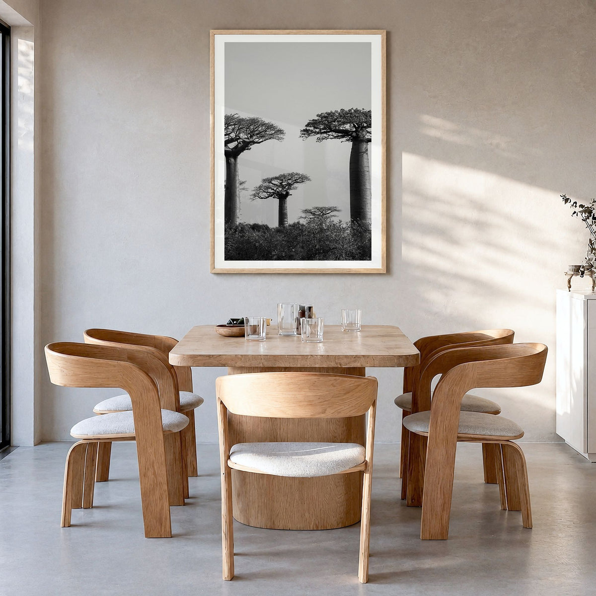 Madagascar Photo Poster in a natural wood frame, hanging in a dining room, white border