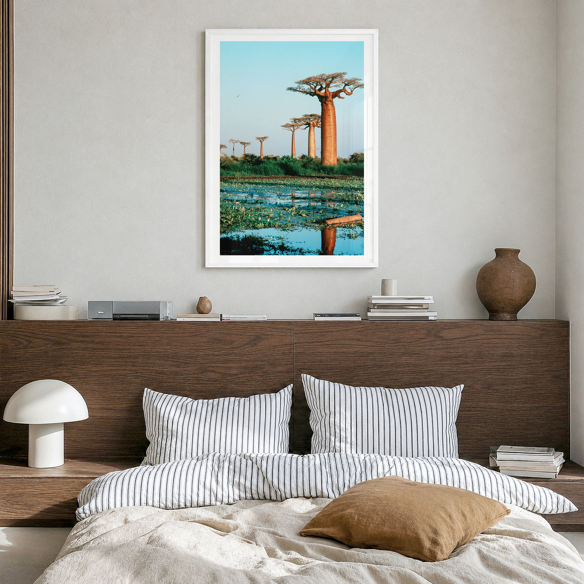 Madagascar Photo Poster in a white wood frame, hanging in a bedroom, white border