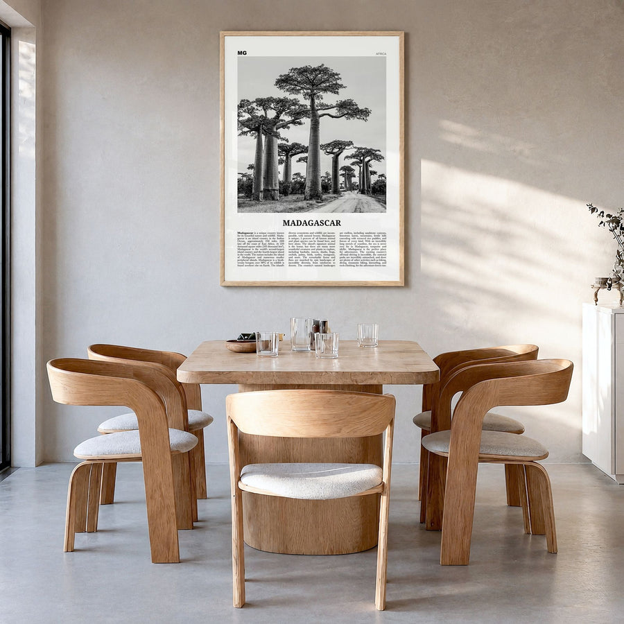 Madagascar Newspaper Poster in a natural wood frame, hanging in a dining room