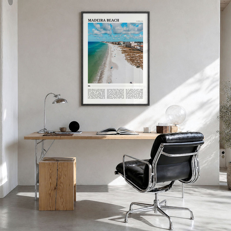 Madeira Beach Travel Poster in a black wood frame, hanging in a bright home office