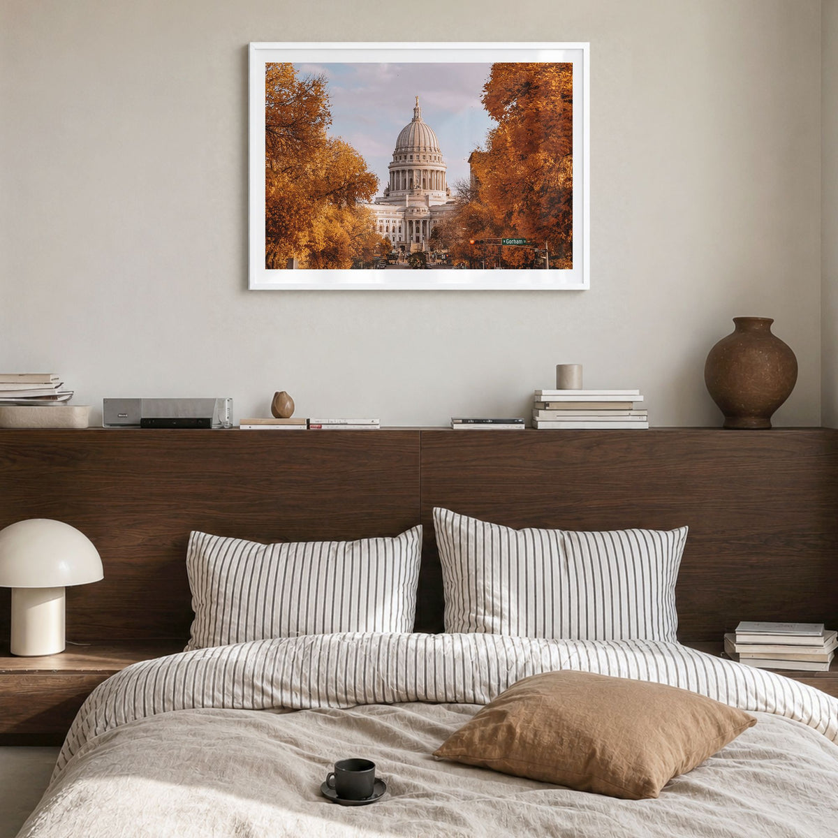 Madison Photo Poster in a white wood frame, hanging in a bedroom, white border