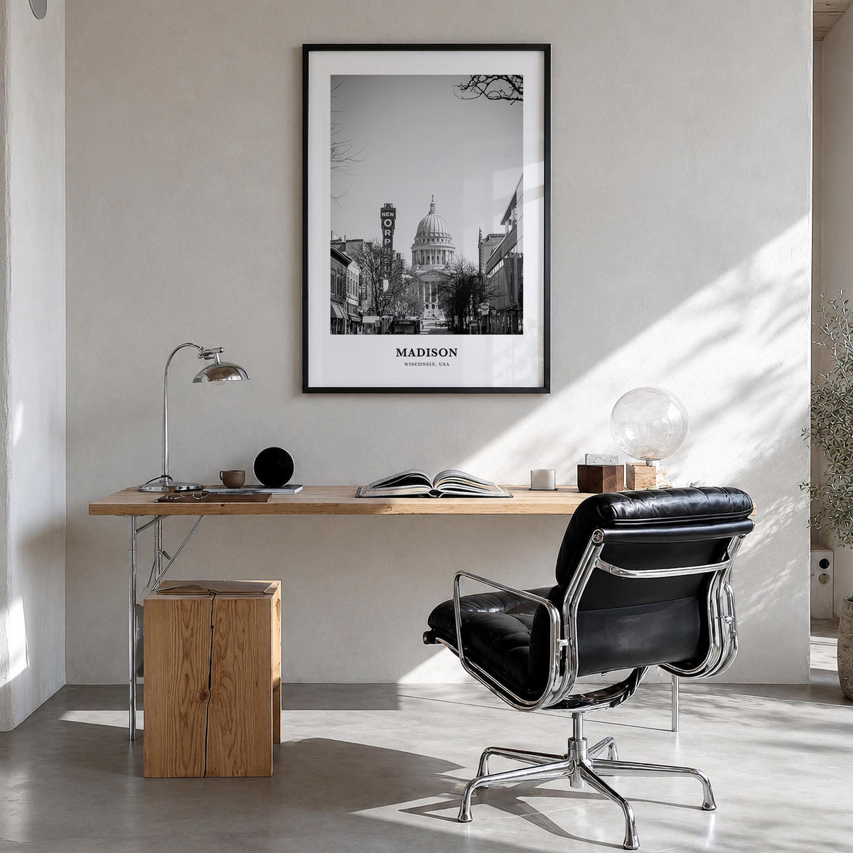 Madison no. 2 black & white classic poster of Wisconsin, USA – vertical wall art in black wood frame, hanging on wall