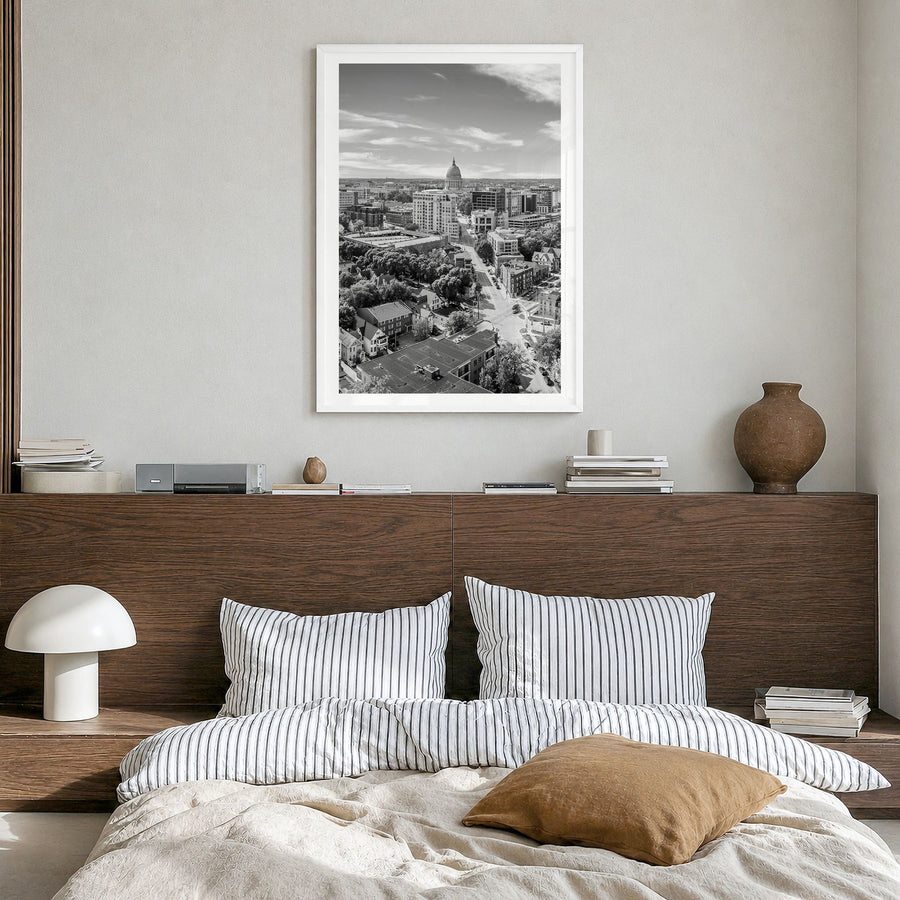 Madison Photo No 1 Poster in a white wood frame, hanging in a bedroom, white border